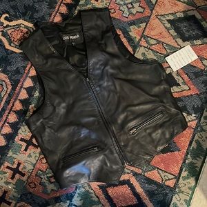 Black leather zipper vest with two zippered pockets. Size large